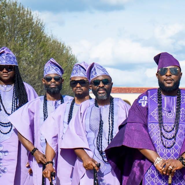 Nigerian wedding party in lavender agbada